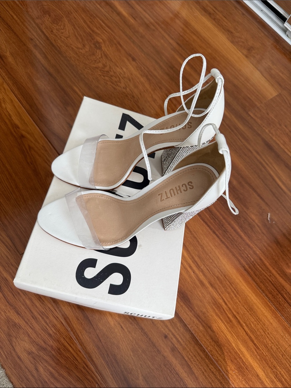SCHUTZ White Ankle-Tie Clear Strap Block Heel Sandals with Silver Accent